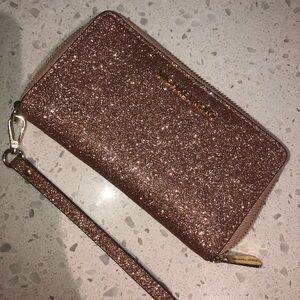 Michael Kors Rose Gold Glitter Wristlet Wallet.